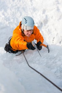 bigstock-Man-Climbing-Frozen-Waterfall-43129177